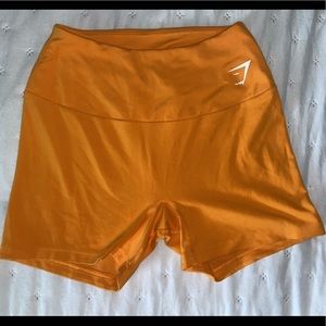 Brand new, never worn orange Gymshark training shorts